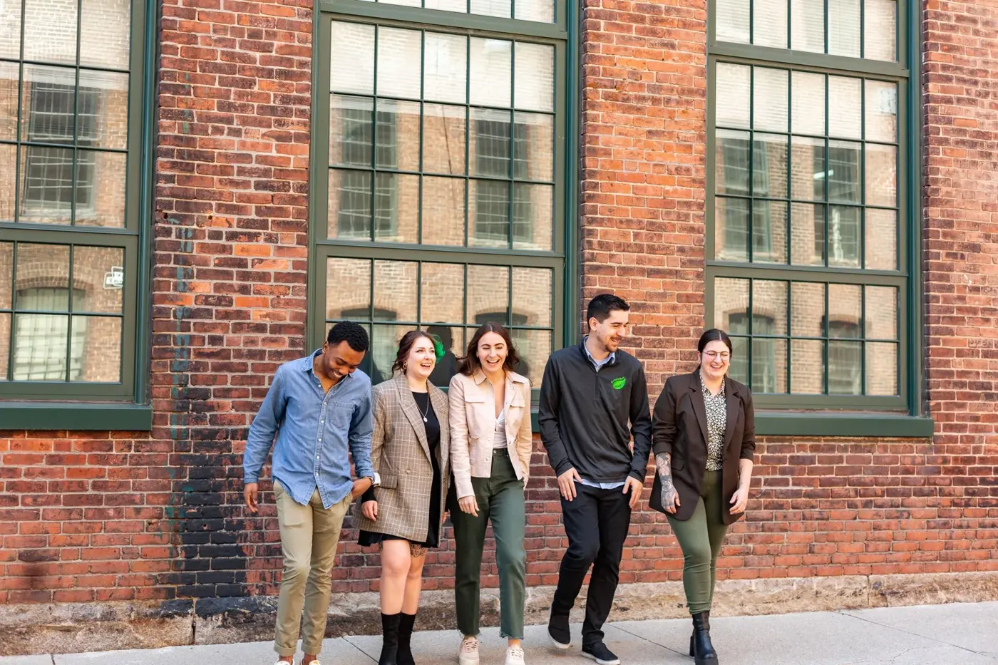 The BusySeed team walking outside the office